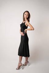 Silk Closet cowl neck black slip midi dress. Side view